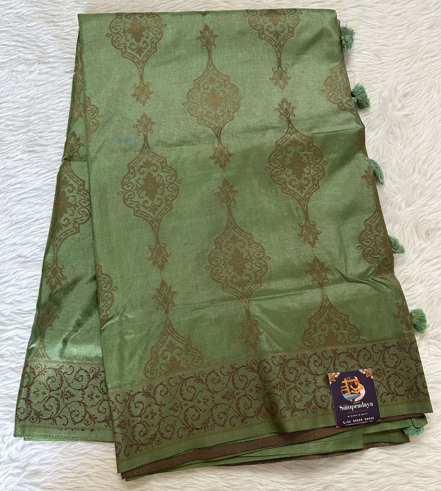 Semi Raw Silk Saree Light Green Colored Complemented with a Zari Border. - Sampradaya Designer Studio