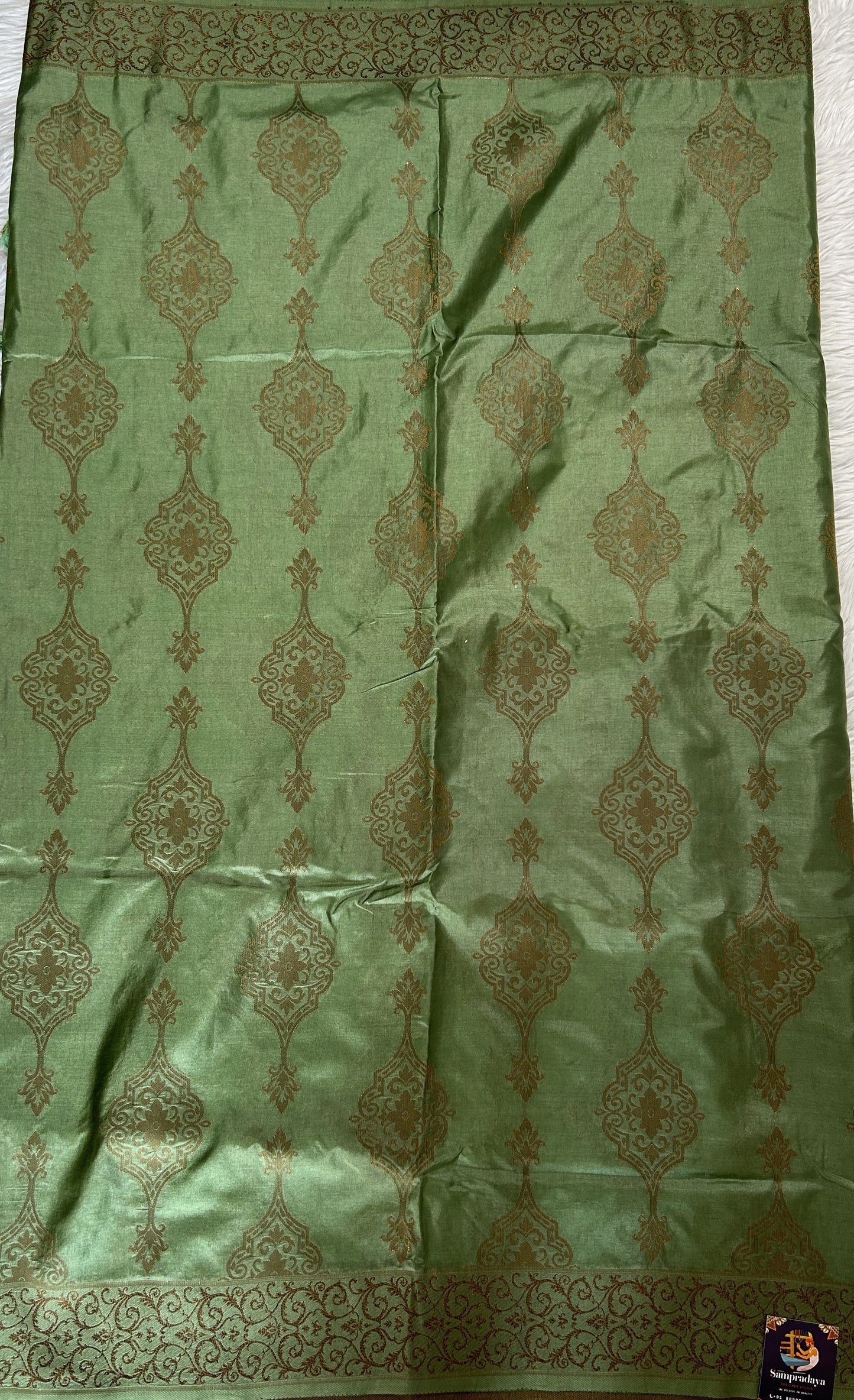 Semi Raw Silk Saree Light Green Colored Complemented with a Zari Border. - Sampradaya Designer Studio