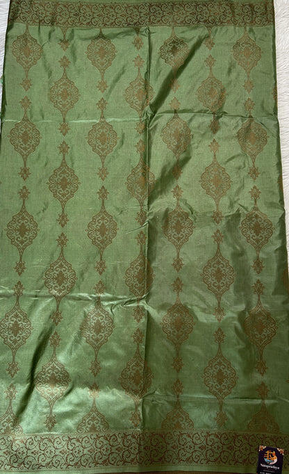 Semi Raw Silk Saree Light Green Colored Complemented with a Zari Border. - Sampradaya Designer Studio