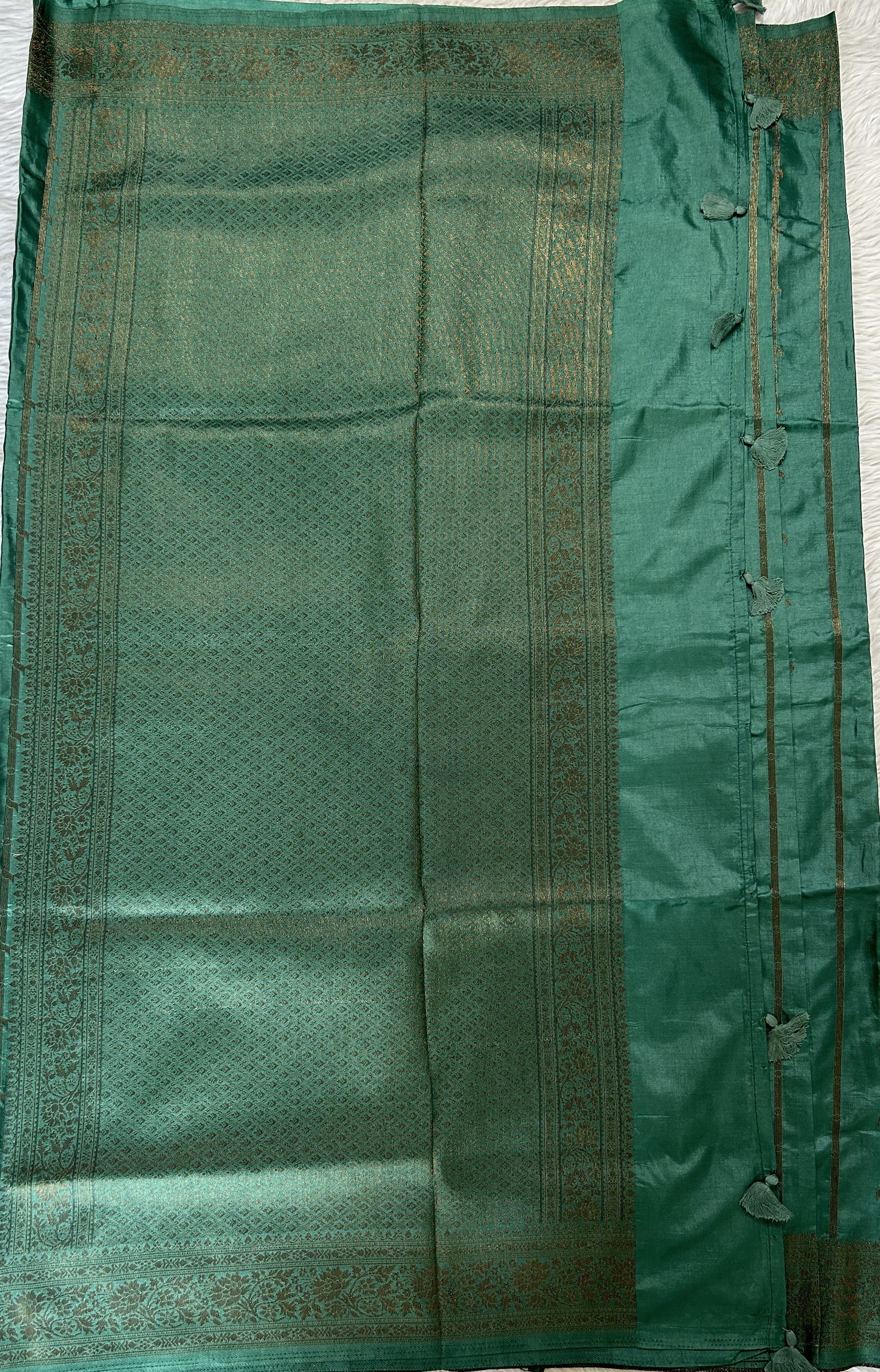 Semi Raw Silk Saree Castleton Green Colored Complemented with a Zari Border. - Sampradaya Designer Studio