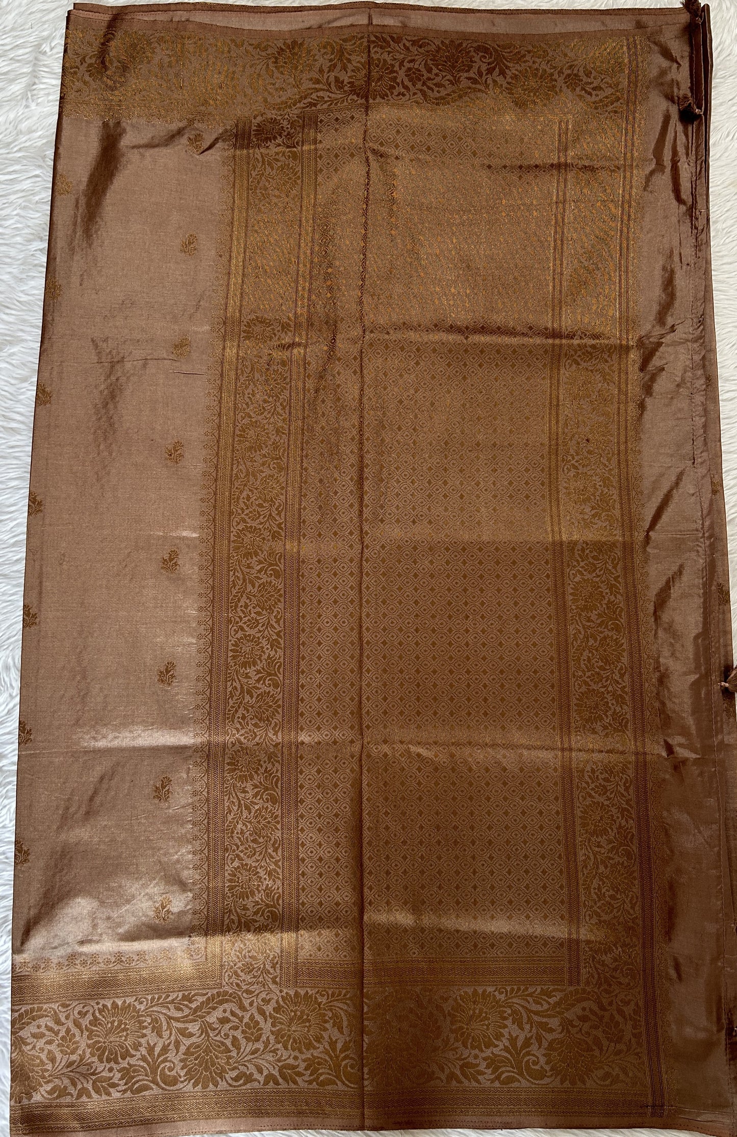 Semi Raw Silk Saree Brown Colored Complemented with a Zari Border. - Sampradaya Designer Studio