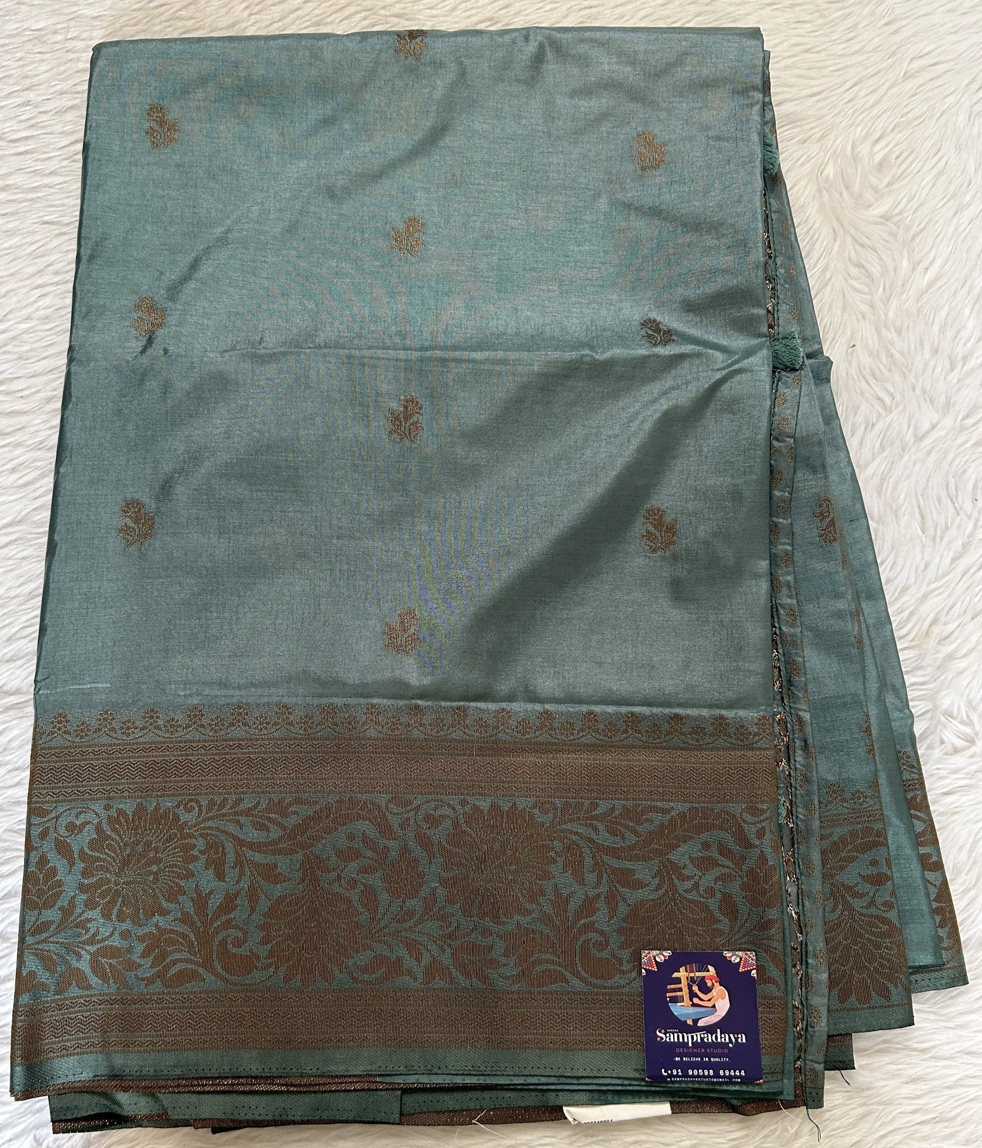 Semi Raw Silk Saree Sea Blue Colored Complemented with a Zari Border. - Sampradaya Designer Studio