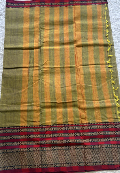 Narayanpet Cotton Saree Avocado Colored Complemented with a Thread Border.