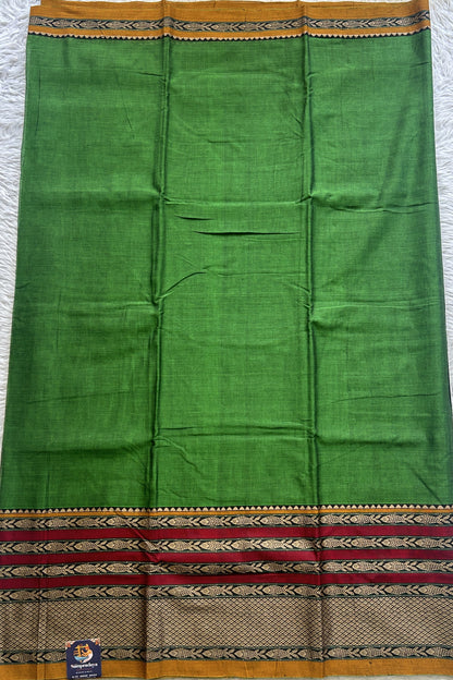 Narayanpet Cotton Saree Leaf Green Colored Complemented with a Minakari Thread Border.