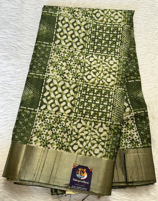 Semi Tussar Saree Green Color Complemented with a Zari Border. - Sampradaya Designer Studio