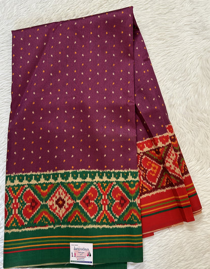 Semi Tussar Saree Purple Color Complemented with a Green and Red Ikkat Border. - Sampradaya Designer Studio