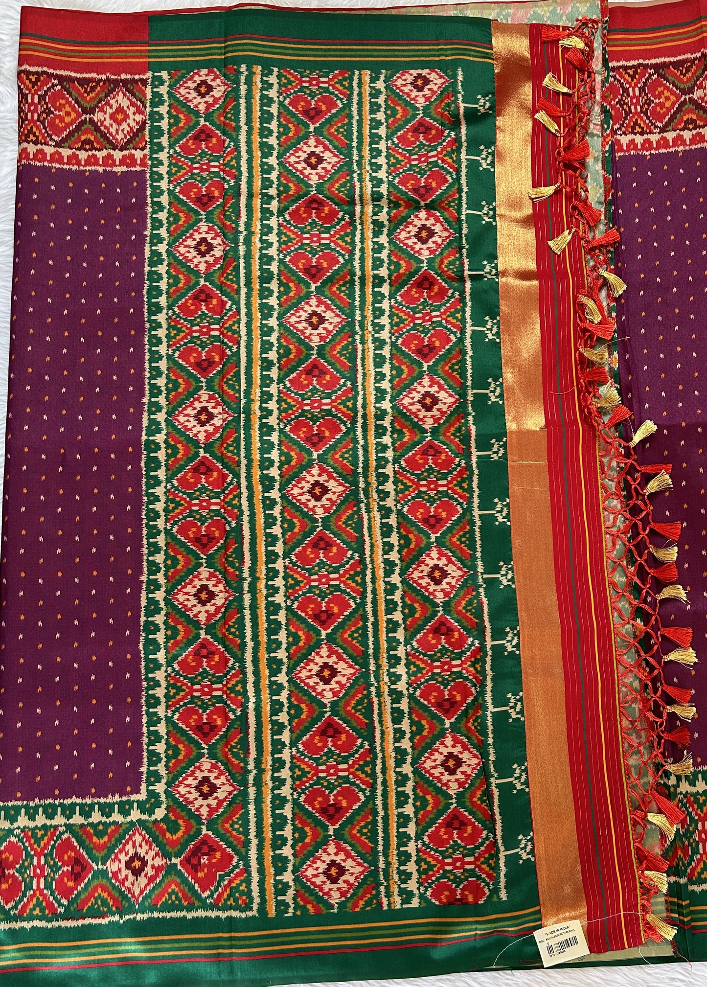 Semi Tussar Saree Purple Color Complemented with a Green and Red Ikkat Border. - Sampradaya Designer Studio