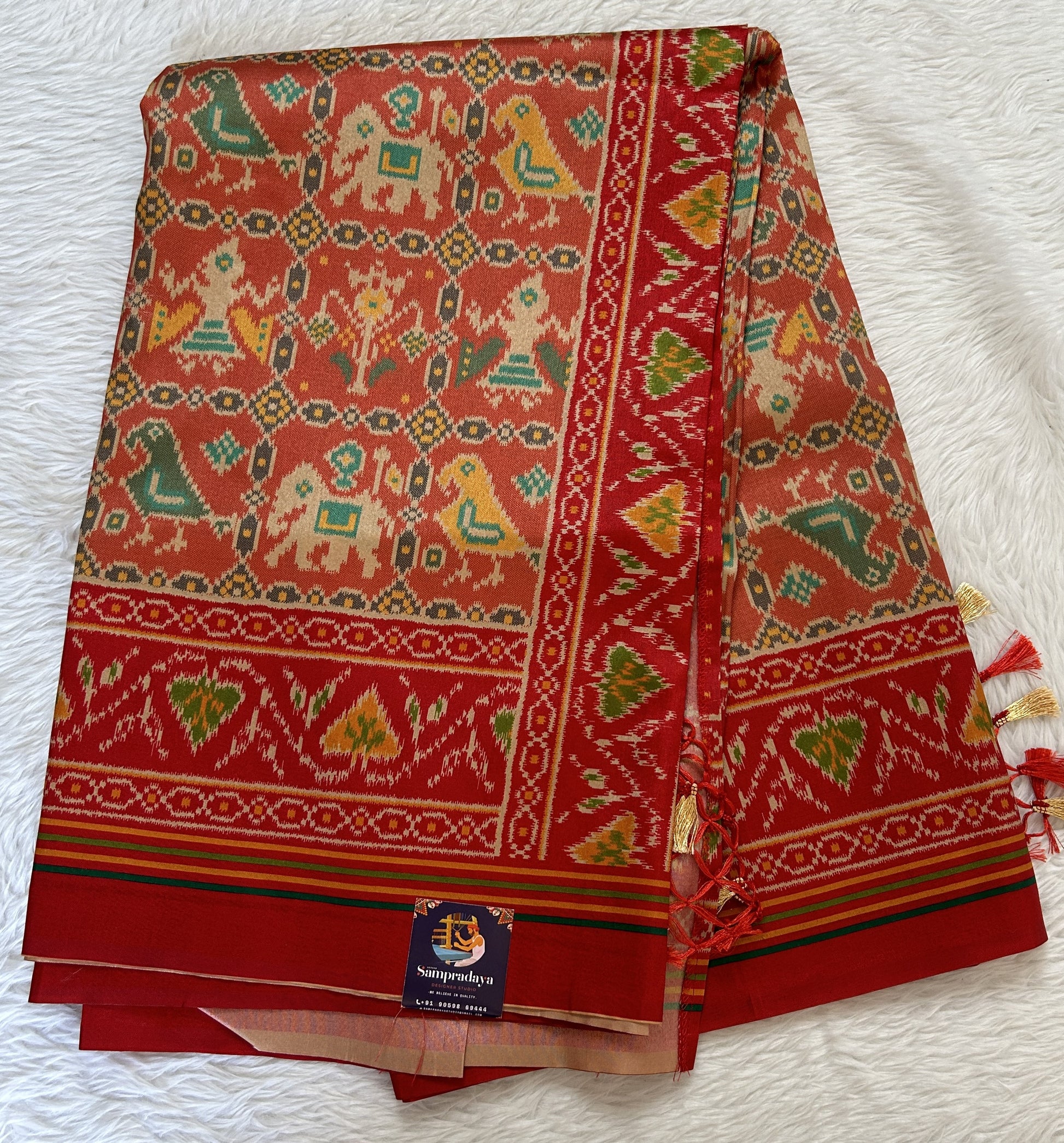 Semi Tussar Saree Red Color Complemented with a Ink Maroon Ikkat Border. - Sampradaya Designer Studio