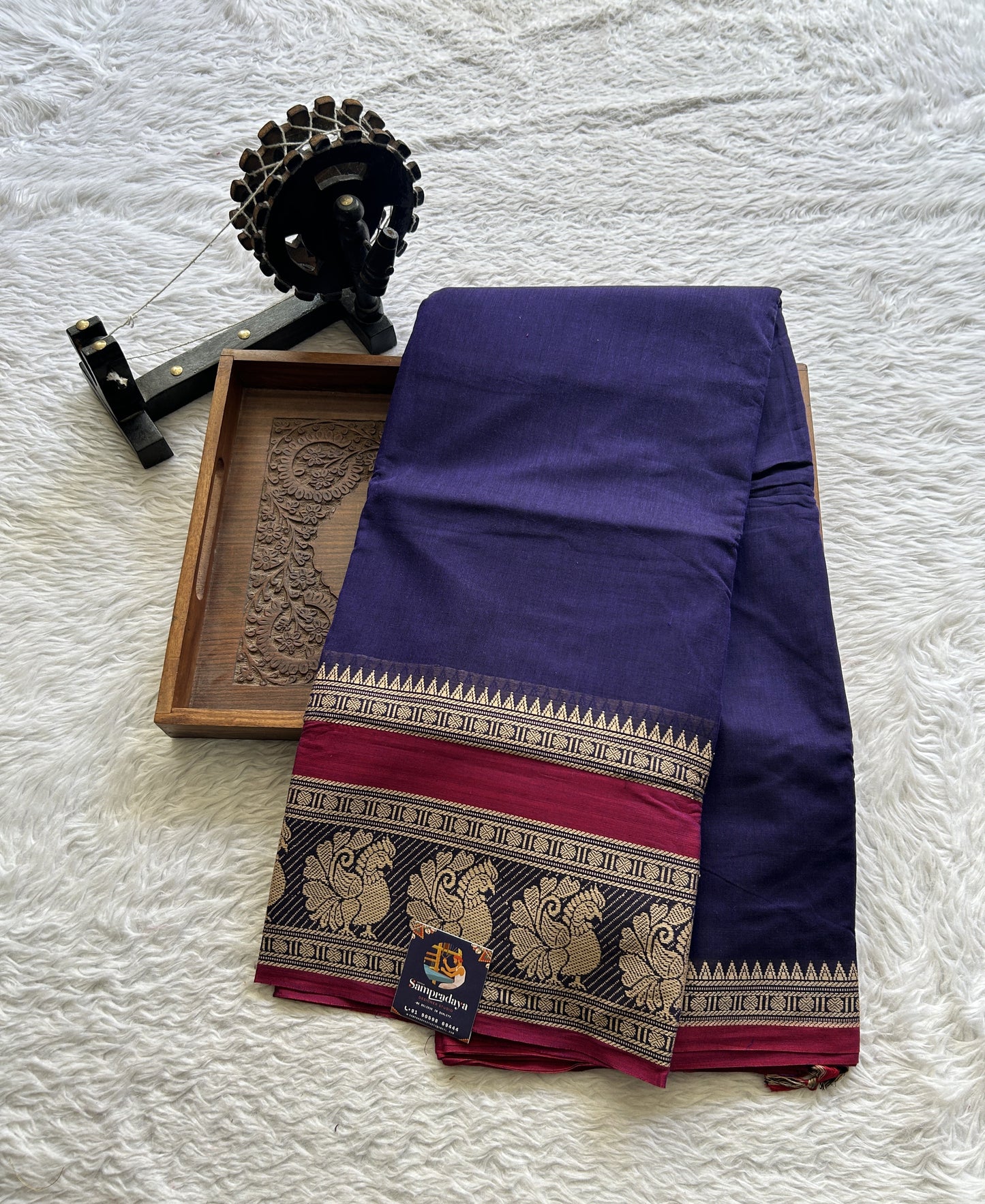 Narayanpet Cotton Saree Violet Colored Complemented with a Peacock Border.