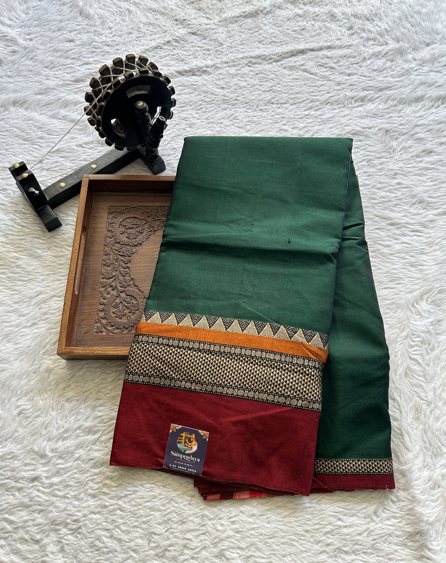 Narayanpet Cotton Saree Dark Green Colored Complemented with a Double Border.