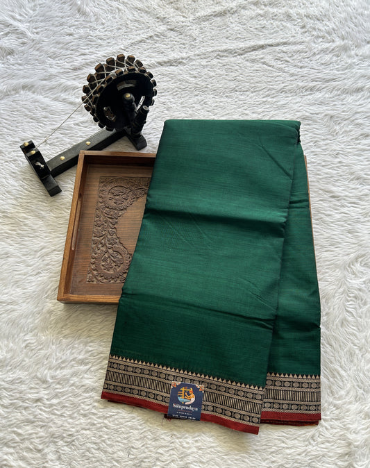 Narayanpet Cotton Saree Forest Green Colored Complemented with a Thread Border.