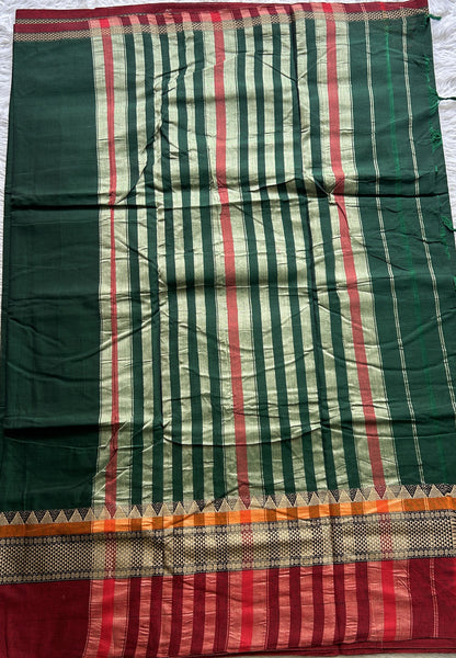 Narayanpet Cotton Saree Dark Green Colored Complemented with a Double Border.