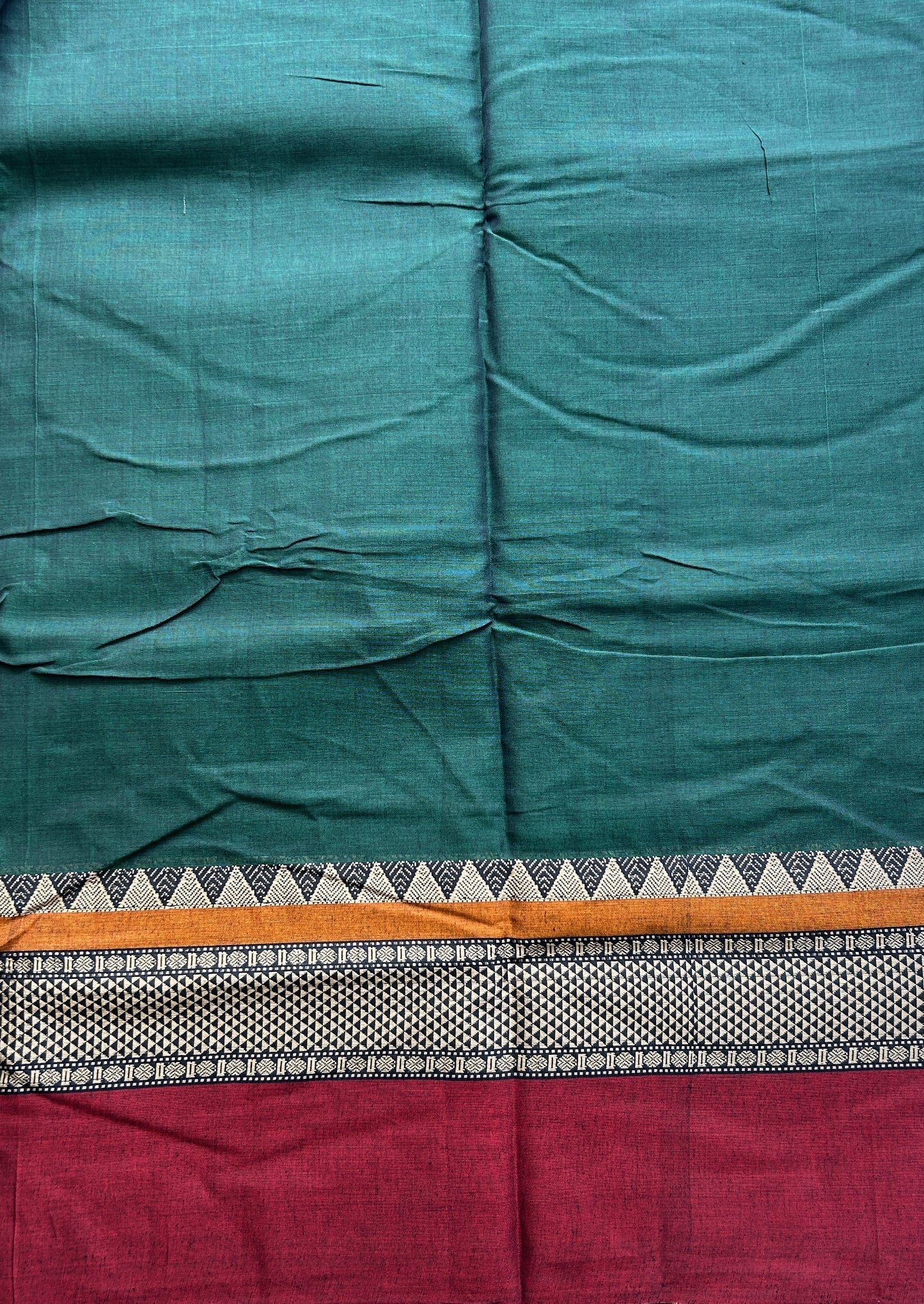 Narayanpet Cotton Saree Dark Green Colored Complemented with a Double Border.