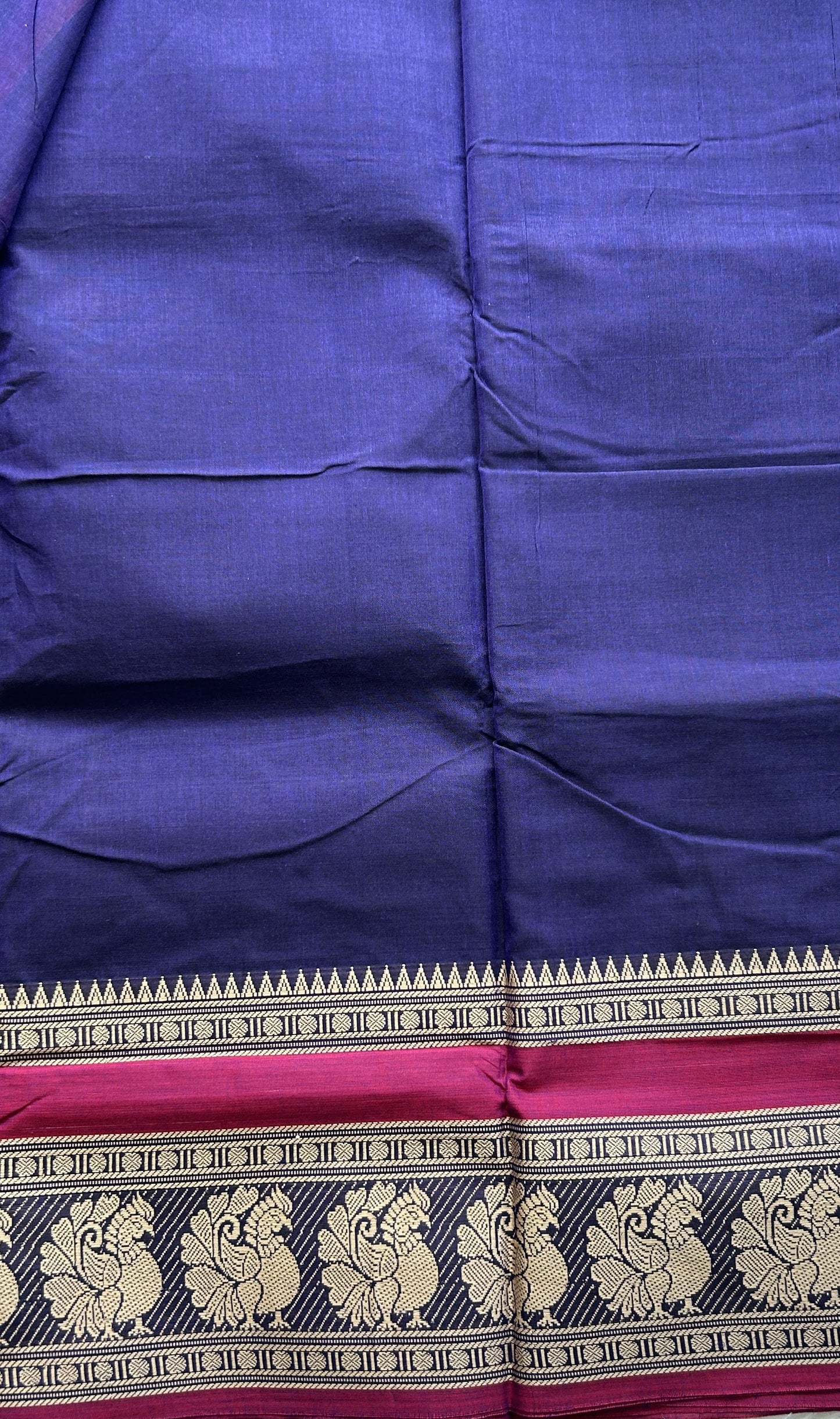 Narayanpet Cotton Saree Violet Colored Complemented with a Peacock Border.