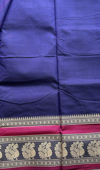 Narayanpet Cotton Saree Violet Colored Complemented with a Peacock Border.