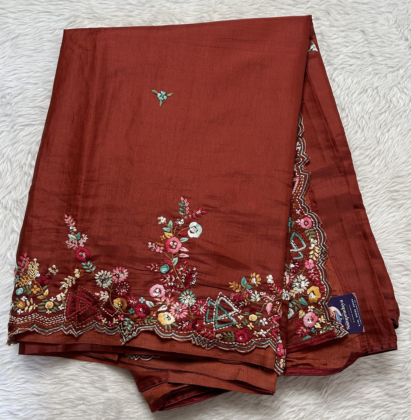 Semi Tussar Designer Saree Rust colored complemented with a Hand Embroidery border. - Sampradaya Designer Studio