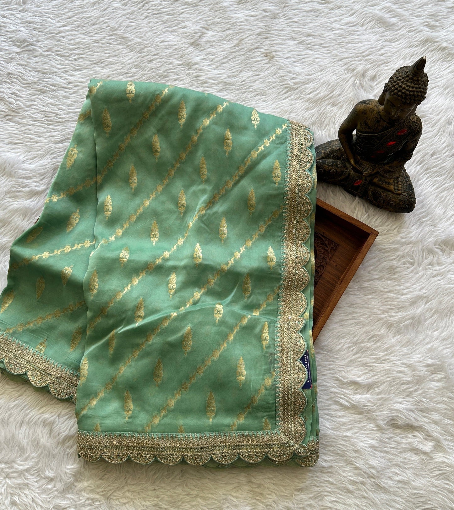 Banarasi Georgette Saree Sea Green Colored Complemented with a Lace border. - Sampradaya Designer Studio