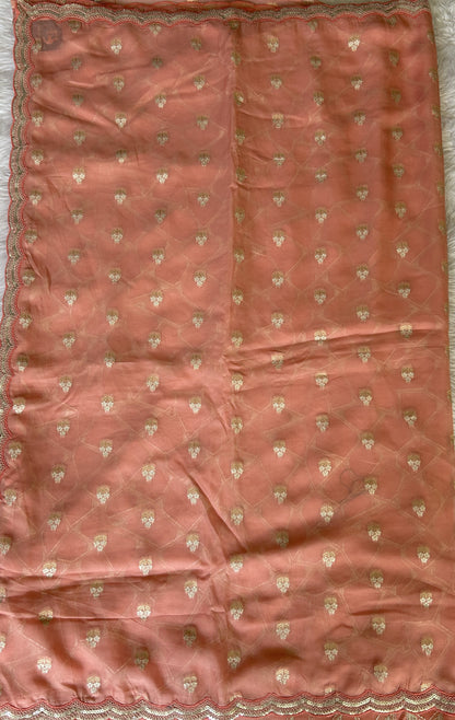 Banarasi Georgette Saree Peach Colored Complemented with a Lace border. - Sampradaya Designer Studio