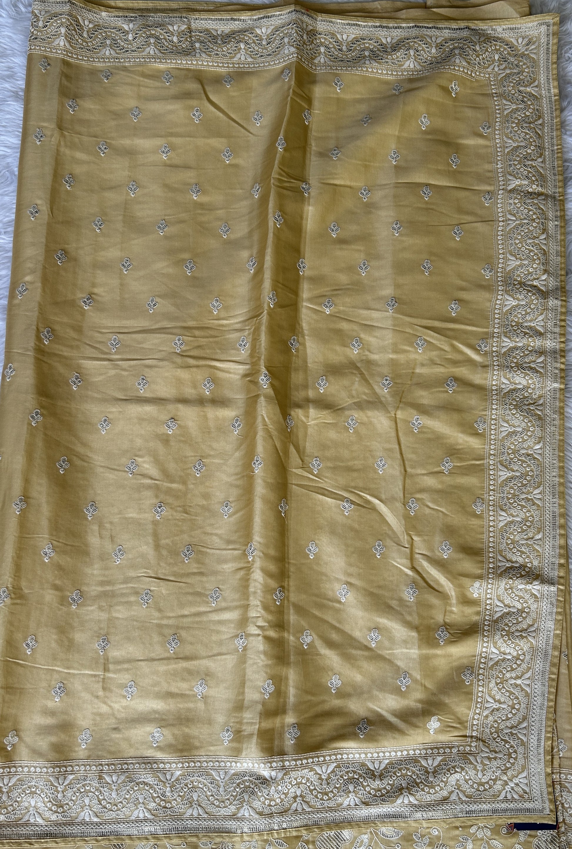 Crepe Silk Saree Party Wear Lemon Yellow colored complemented with a Machine Embroidery border. - Sampradaya Designer Studio