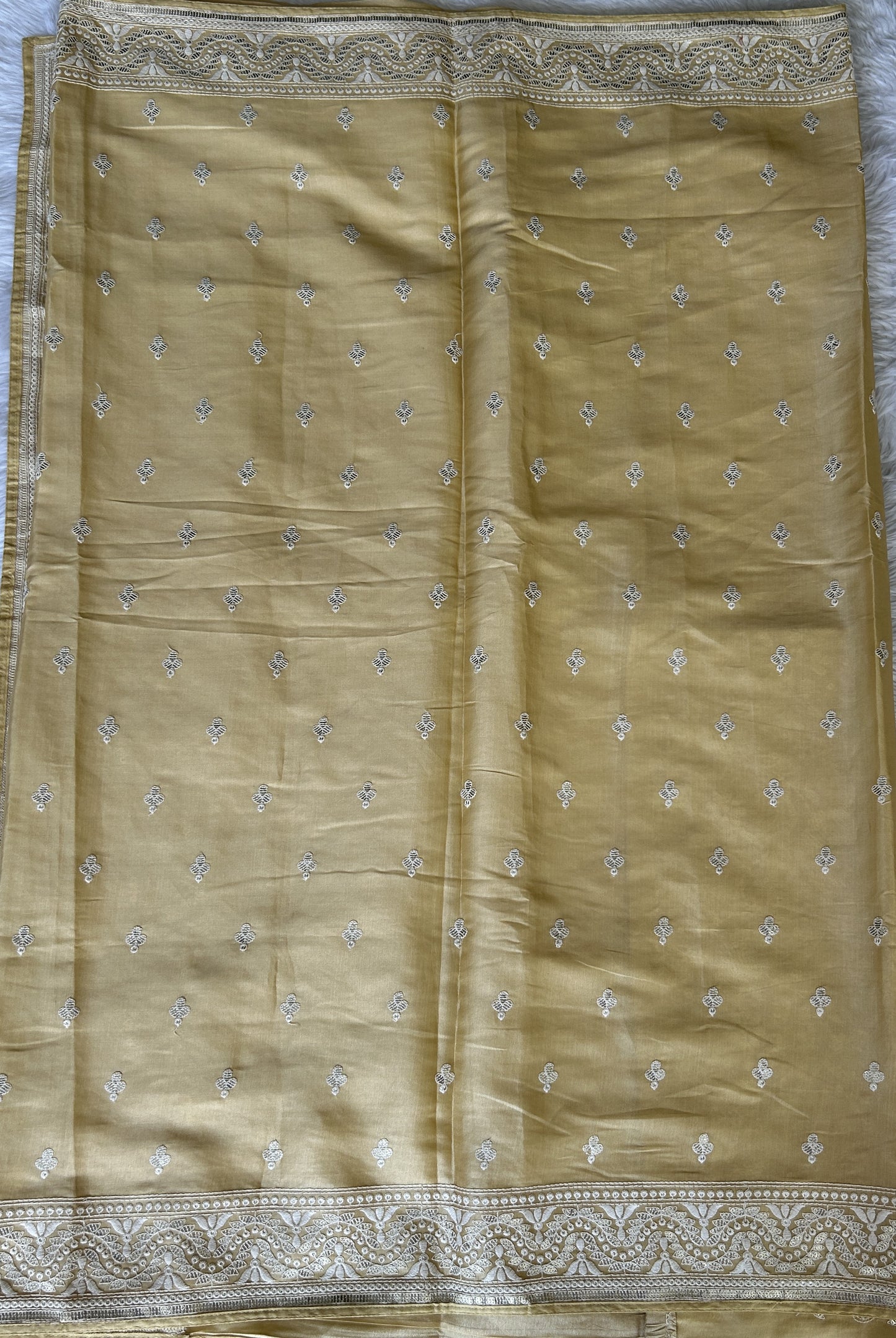 Crepe Silk Saree Party Wear Lemon Yellow colored complemented with a Machine Embroidery border. - Sampradaya Designer Studio