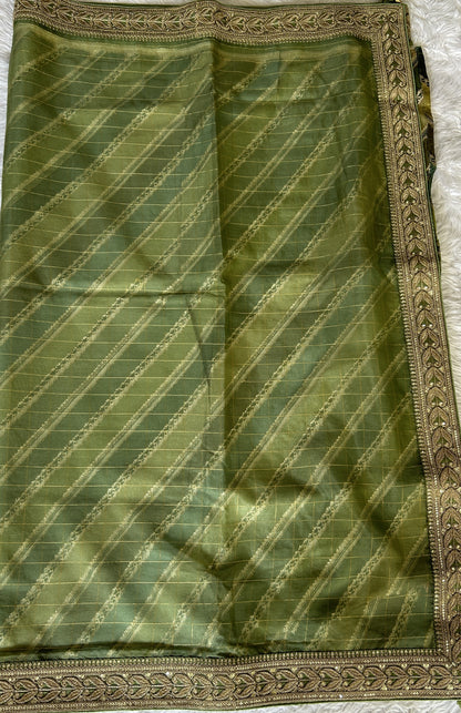 Organza Saree Party Wear Green colored complemented with a Lace border. - Sampradaya Designer Studio