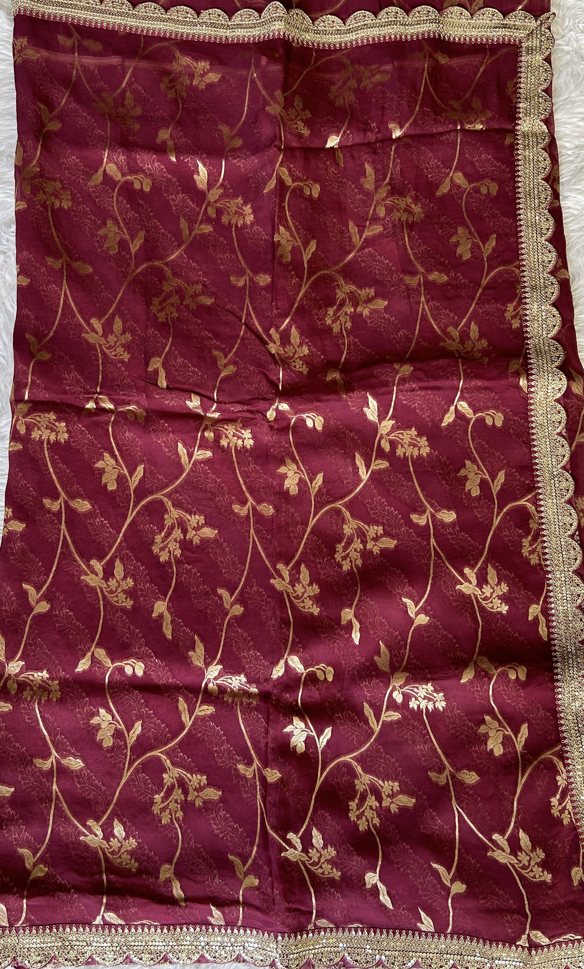 Organza Saree Party Wear Magenta colored complemented with a Lace border. - Sampradaya Designer Studio