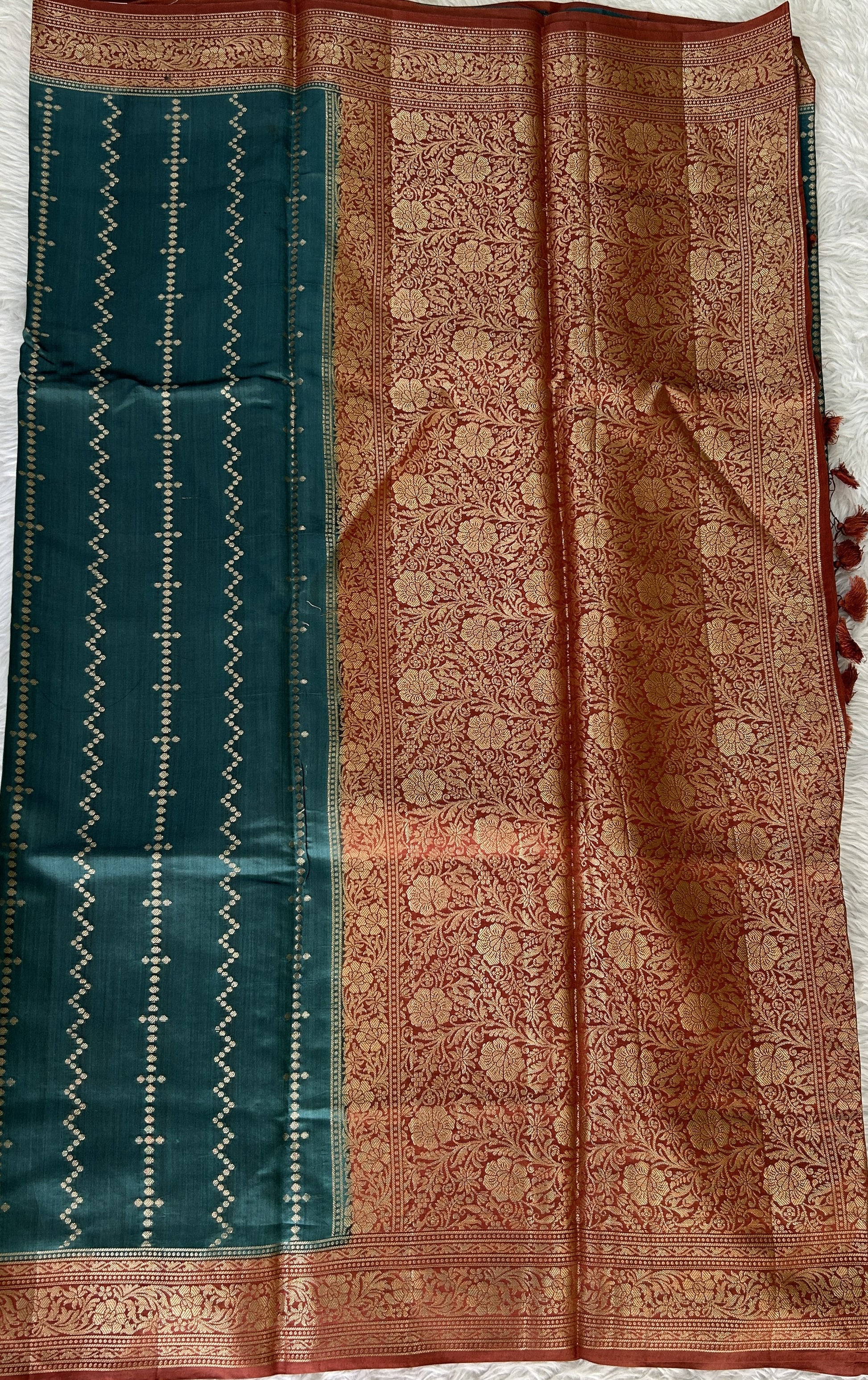 Banarasi Chiniya Silk Saree Turquoise Blue Colored Complemented with a Rust Zari Border. - Sampradaya Designer Studio