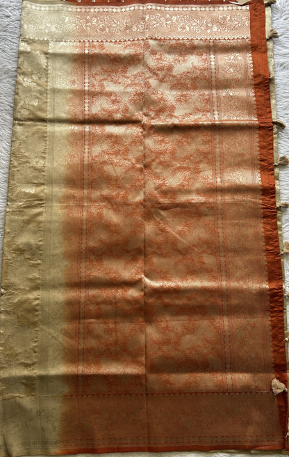 Semi Raw Silk Saree Beige Colored Complemented with a Zari Border.