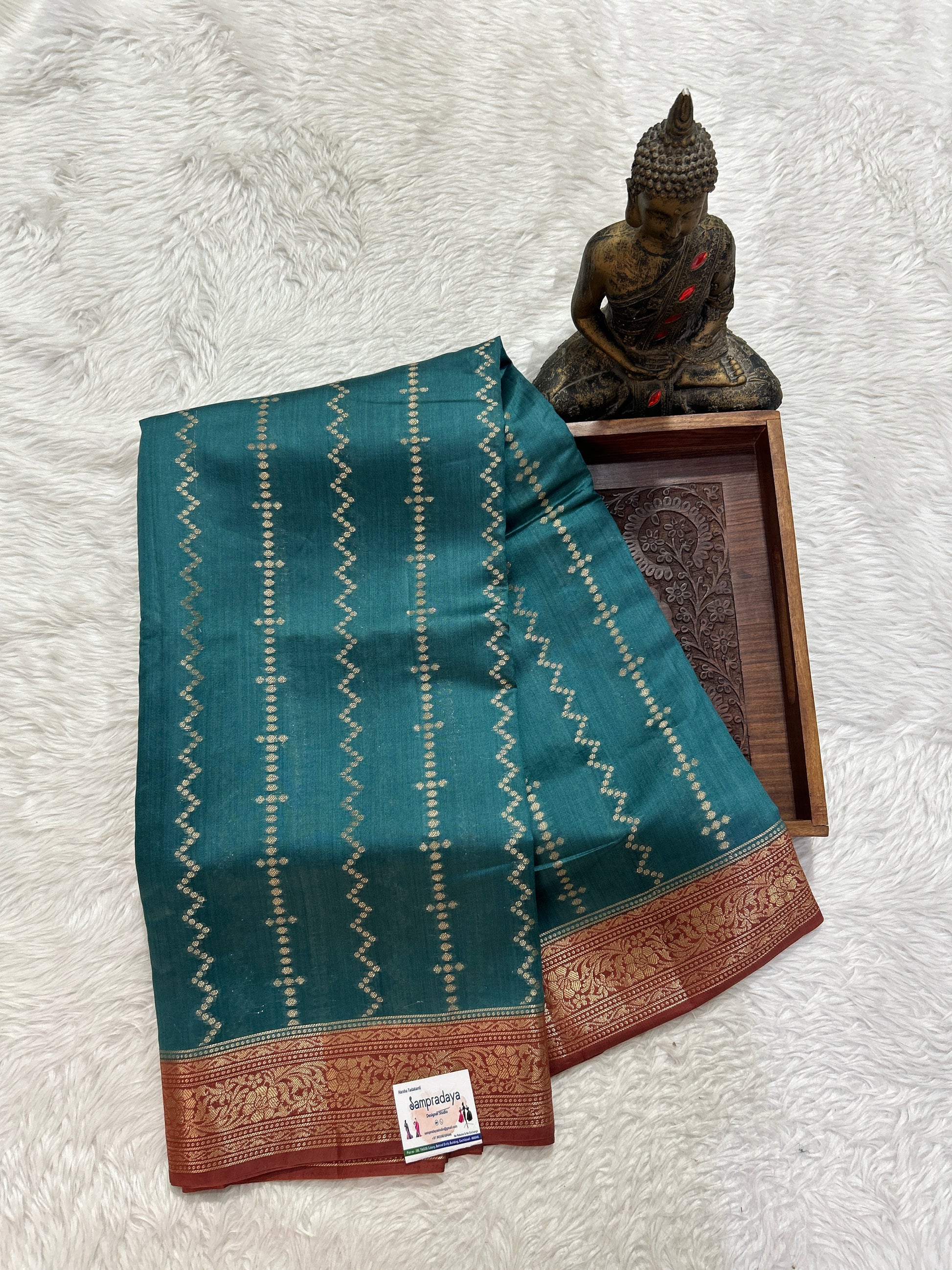 Banarasi Chiniya Silk Saree Turquoise Blue Colored Complemented with a Rust Zari Border. - Sampradaya Designer Studio