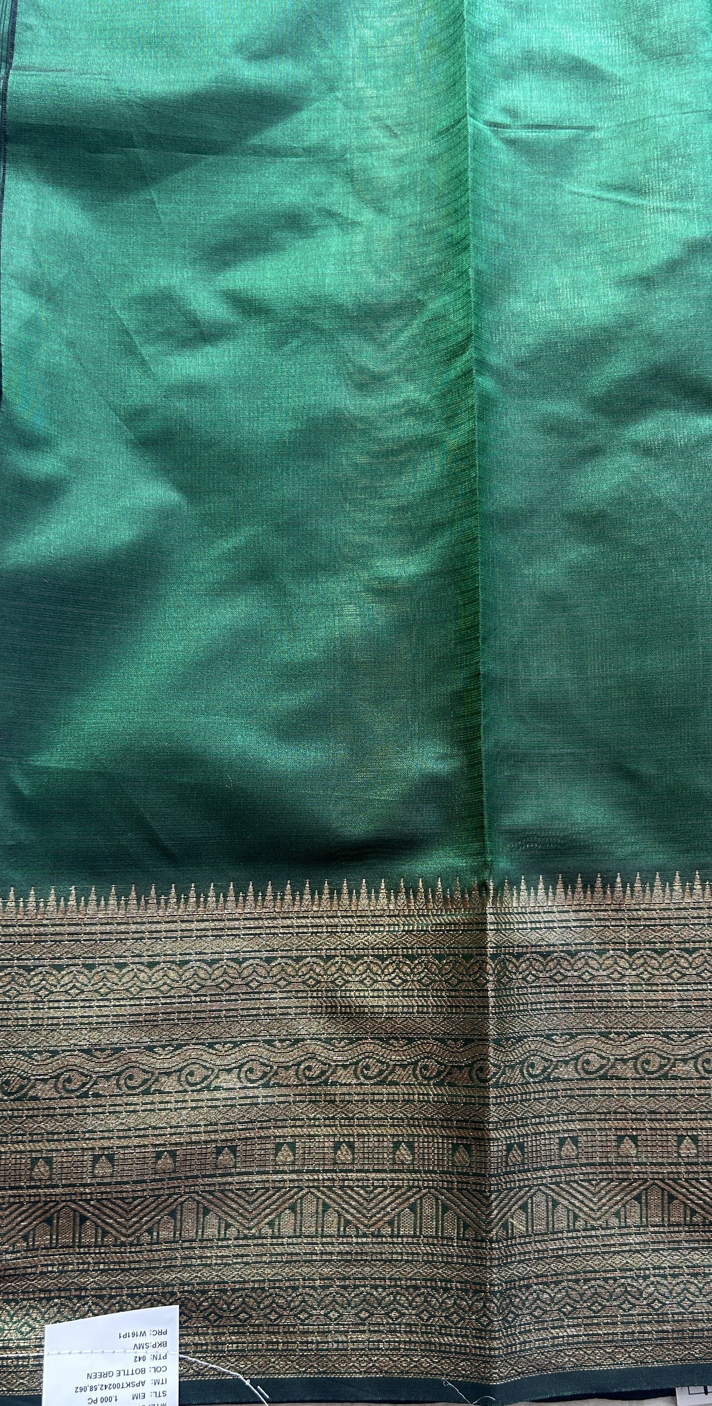 Silk kota Saree Dark Green colored Complemented with a Zari Border.