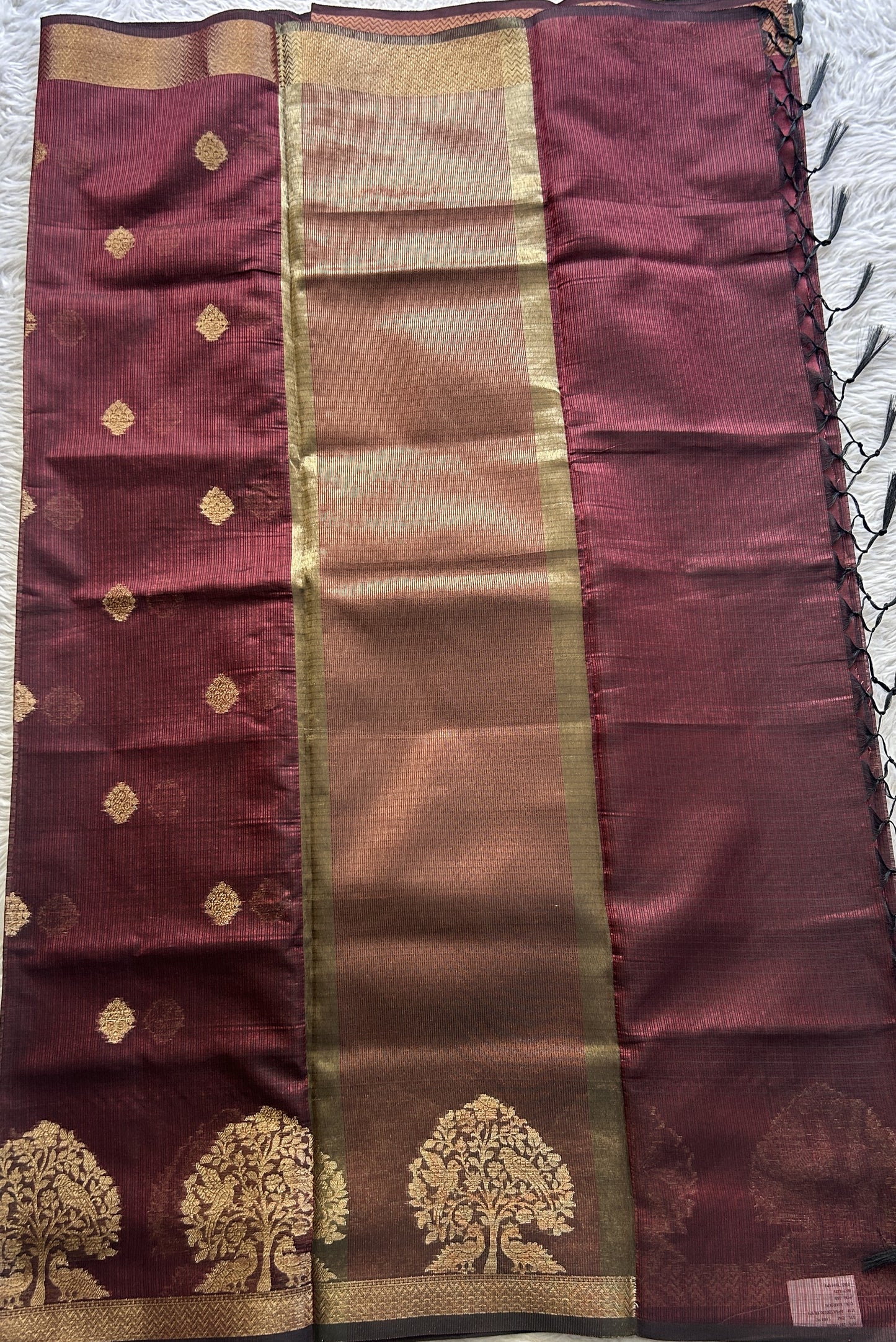 Silk kota Saree Maroon colored Complemented with a Zari Border.