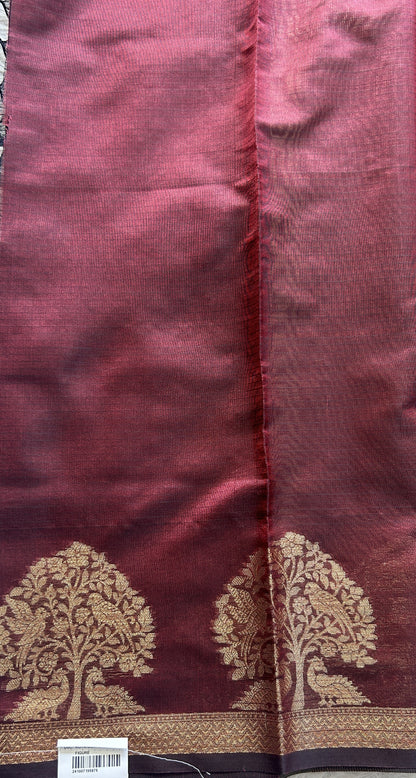 Silk kota Saree Maroon colored Complemented with a Zari Border.