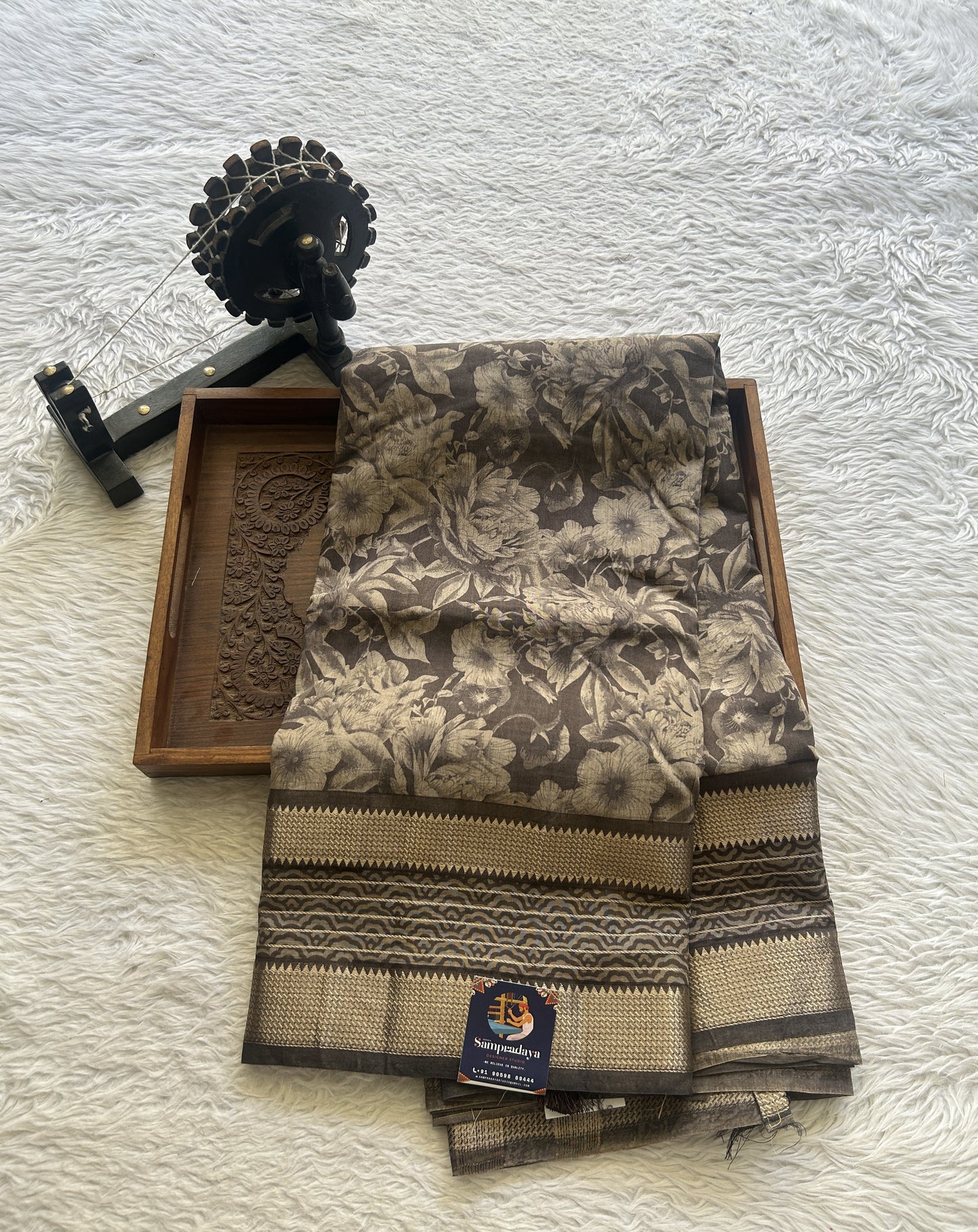 Dola Crepe Saree Coffee Colored Complemented with a Zari Border.