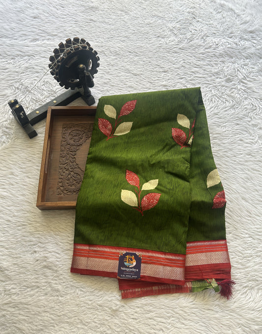 Dola Crepe Saree Leaf Green Colored Complemented with a Zari Border.