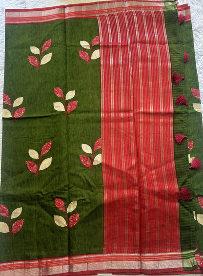 Dola Crepe Saree Leaf Green Colored Complemented with a Zari Border.