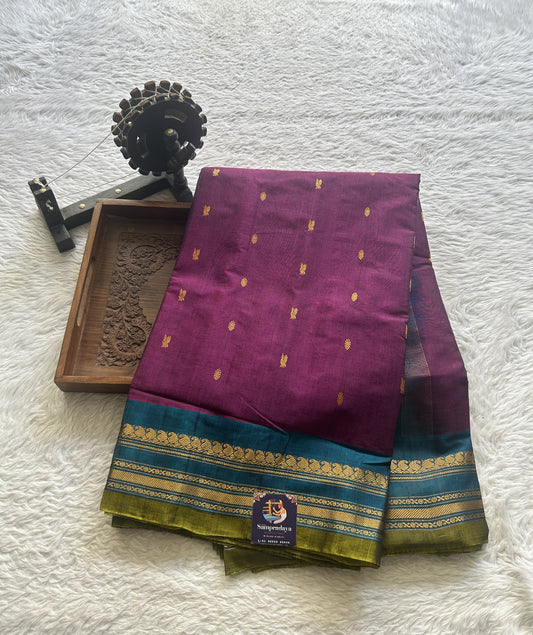 Gadwal Sico Saree Dark Purple colored complemented with a Blue Zari Border.