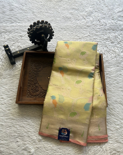 Silk kota Saree Pale Yellow colored Complemented with a Muniya Border.