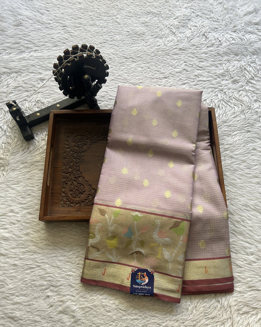 Silk kota Saree Light Lilac colored Complemented with a Muniya Border.