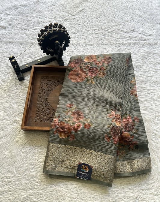 Banarasi Fancy Crushed Saree Gray Colored Complemented with a Zari Border.