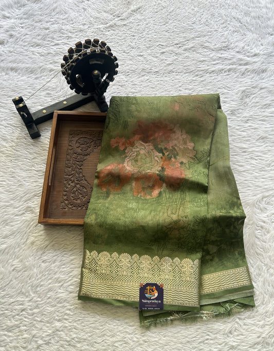 Banarasi Soft Silk Saree Pine Green Colored Complemented with a Zari Border.