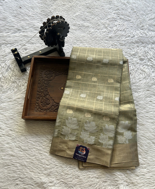 Tissue Silk kota Saree Olive Green colored Complemented with a Buti Border.