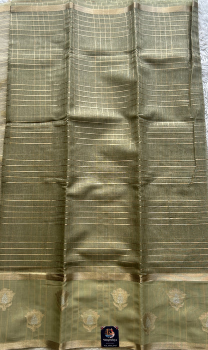 Tissue Silk kota Saree Green colored Complemented with a Buti Border.