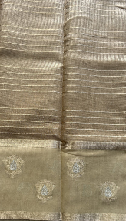 Tissue Silk kota Saree Gold colored Complemented with a Buti Border.