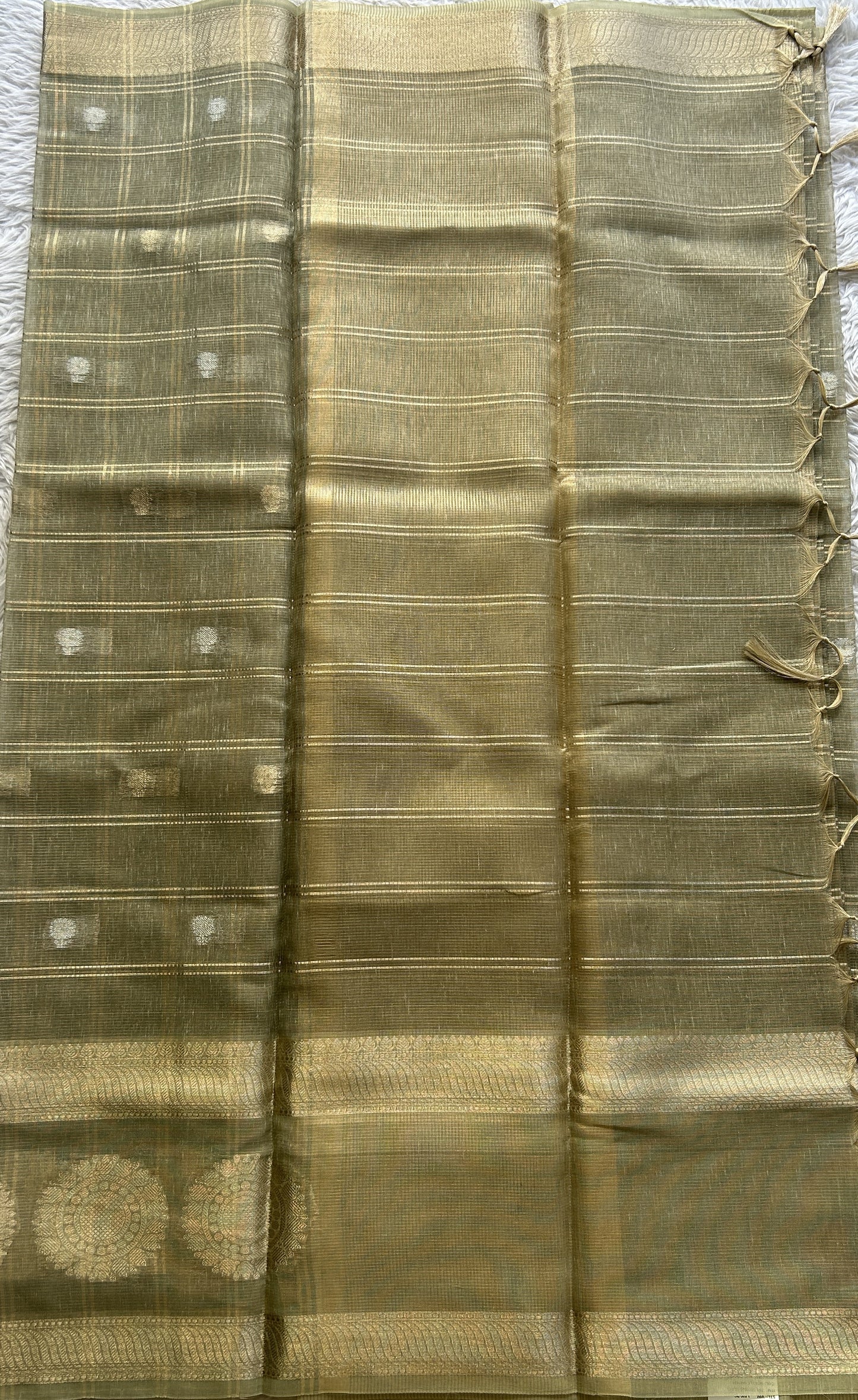 Tissue Silk kota Saree Light Green colored Complemented with a Buti Border.