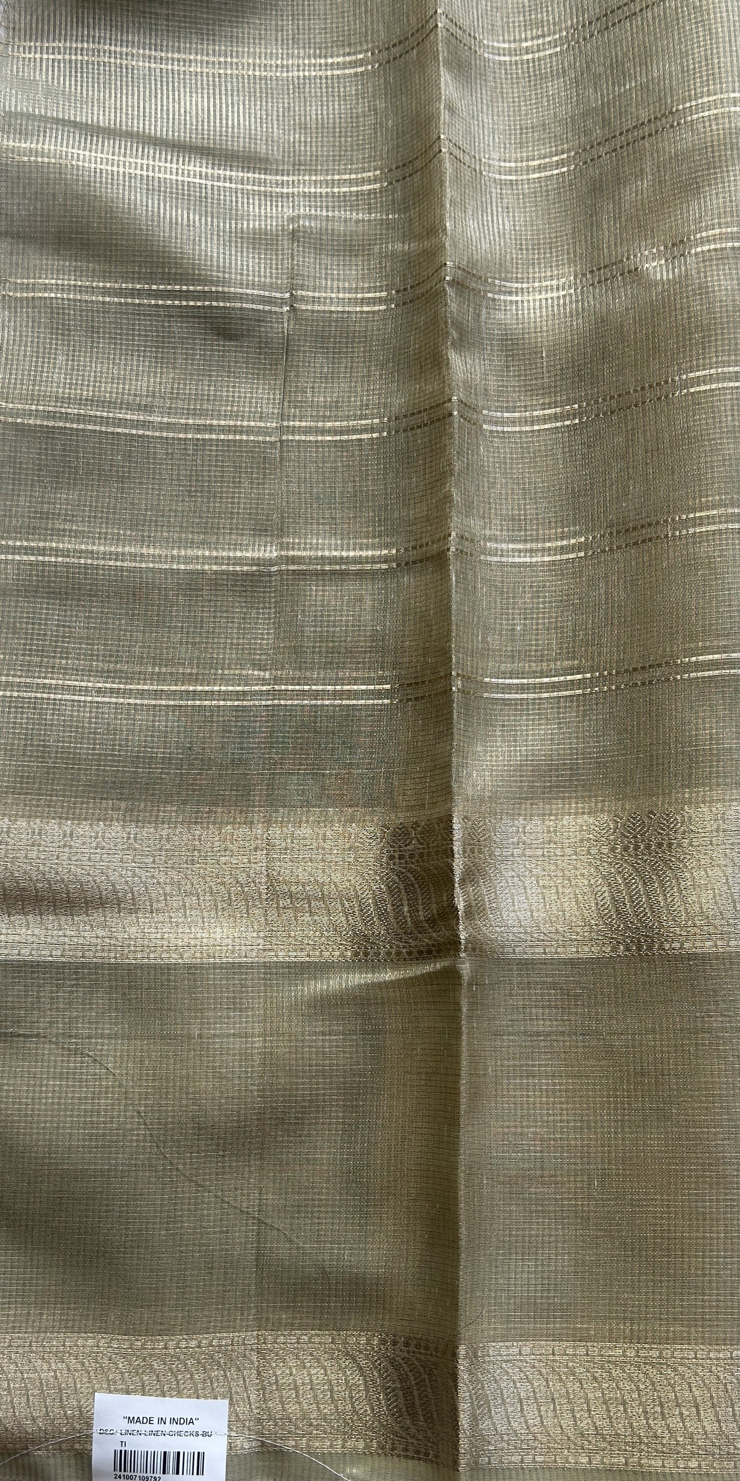 Tissue Silk kota Saree Light Green colored Complemented with a Buti Border.