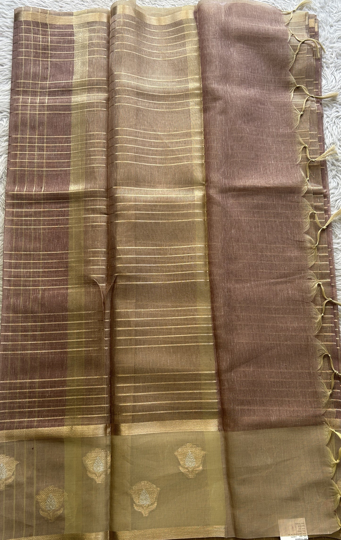 Tissue Silk kota Saree Onion Pink colored Complemented with a Buti Border.