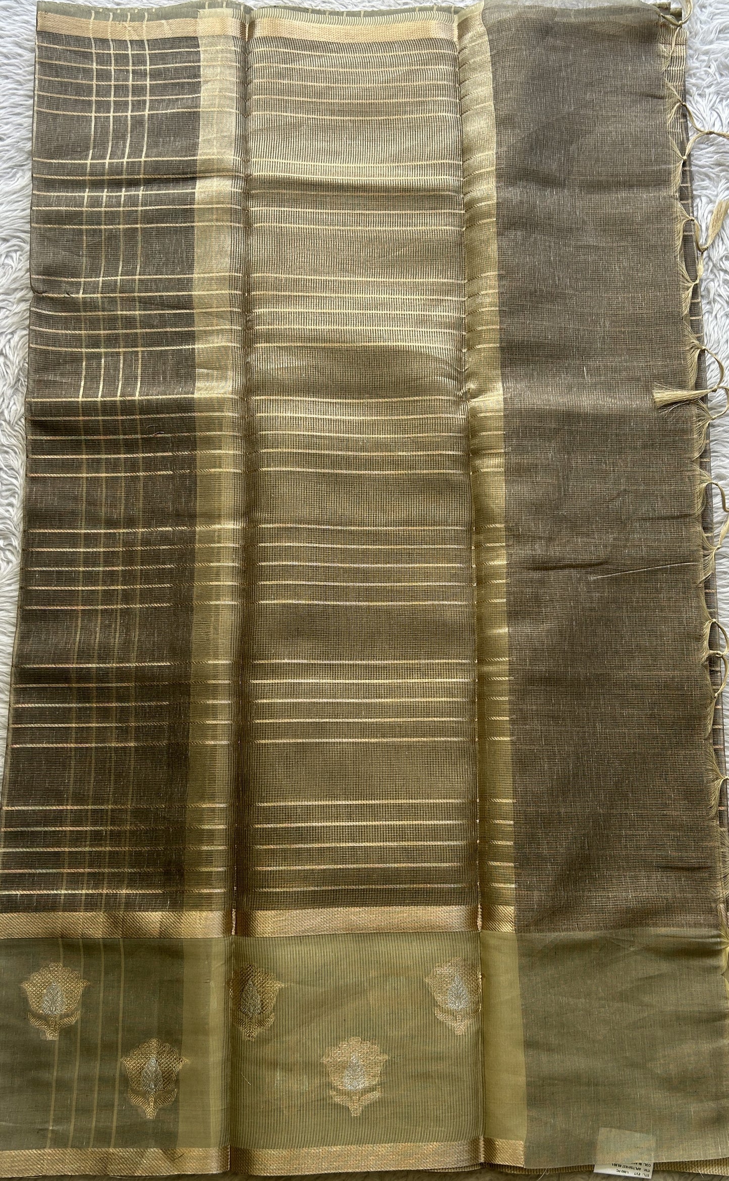 Tissue Silk kota Saree Ash colored Complemented with a Buti Border.