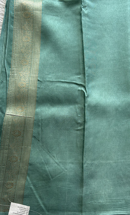 Mona Silk Saree Aqua Blue Colored Complemented with a Mashrur Border.