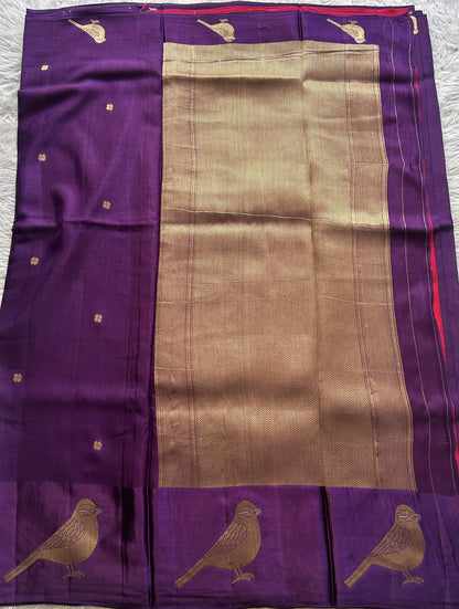 Mona Silk Saree Dark Violet Colored Complemented with a Mashrur Border.