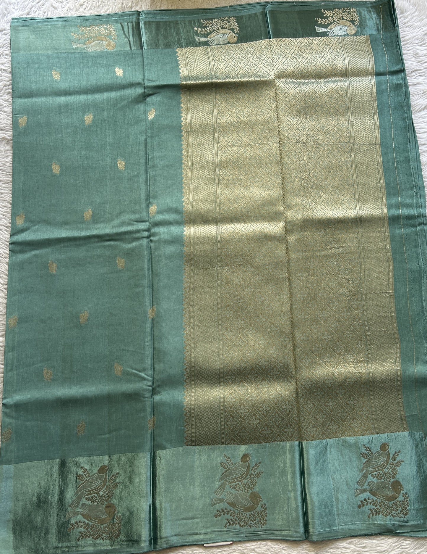 Mona Silk Saree Seafoam Green Colored Complemented with a Mashrur Border.